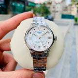 Buy Shop Tissot Chemin Des Tourelles Powermatic 80 Rubies Mother of Pearl Dial Silver Steel Strap Watch For Women - T099.207.11.113.00 USA Online