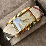 Buy Shop Burberry Pioneer Champagne Dial Haymarket Beige Leather Strap Watch for Women - BU9407 USA Online