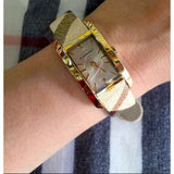 Buy Shop Burberry Pioneer Gold Dial Haymarket Beige Leather Strap Watch for Women - BU9509 USA Online