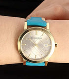 Buy Shop Burberry The City Gold Dial Blue Leather Strap Watch for Women - BU9018 USA Online