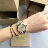 Buy Shop Burberry The City Gold Dial Gold Steel Strap Watch for Women - BU9033 USA Online