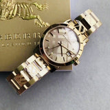 Buy Shop Burberry The City Gold Dial Gold Steel Strap Watch for Women - BU9145 USA Online