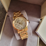 Buy Shop Burberry The City Gold Dial Gold Steel Strap Watch for Women - BU9145 USA Online