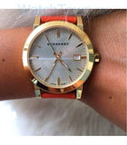 Buy Shop Burberry The City Gold Dial Orange Leather Strap Watch for Women - BU9016 USA Online