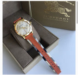Buy Shop Burberry The City Gold Dial Orange Leather Strap Watch for Women - BU9016 USA Online