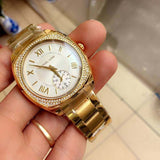 Buy Shop Michael Kors Byrn Quartz Gold Dial Gold Steel Strap Watch For Women - MK6134 USA Online