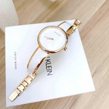 Buy Shop Calvin Klein Seduce White Dial Two Tone Steel Strap Watch for Women - K4E2N616 USA Online