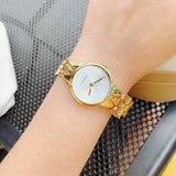 Buy Shop Calvin Klein Snake Silver Dial Yellow Gold Steel Strap Watch For Women - K6E23546 USA Online