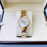 Buy Shop Calvin Klein Snake Silver Dial Yellow Gold Steel Strap Watch For Women - K6E23546 USA Online