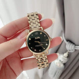 Buy Shop Coach Delancey Black Dial Gold Stainless Steel Strap Watch For Women - 14502813 USA Online