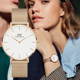 Buy Shop Daniel Wellington Petite Melrose White Dial Rose Gold Mesh Strap Watch For Women - DW00100305 USA Online