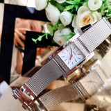Buy Shop Guess Nouveau Diamonds Silver Dial Silver Mesh Bracelet Watch for Women - W0127L1 USA Online