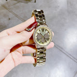 Buy Shop Michael Kors Bryn Pavé Quartz Gold Dial Gold Steel Strap Watch For Women - MK7199 USA Online