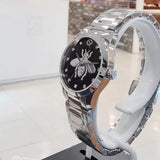 Buy Shop Gucci G Timeless Quartz Diamonds Black Dial Silver Steel Strap Watch For Women - YA1265024 USA Online