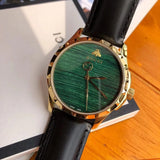 Buy Shop Gucci Le Marche Des Merveilles Quartz Green Dial Black Leather Strap Watch For Women - YA126463 USA Online