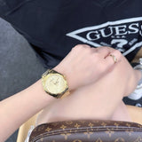 Buy Shop Guess Cubed Analog Gold Dial Gold Steel Strap Watch For Women - GW0606L2 USA Online