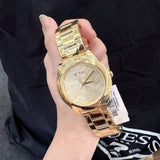 Buy Shop Guess Cubed Analog Gold Dial Gold Steel Strap Watch For Women - GW0606L2 USA Online