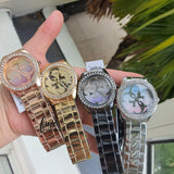 Buy Shop Guess G Twist Diamonds Rose Gold Dial Rose Gold Steel Strap Watch For Women - W1201L3 USA Online