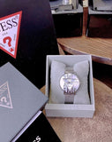Buy Shop Guess Iconic Quartz Silver Dial Silver Mesh Bracelet Watch For Women - GW0527L1 USA Online