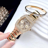 Buy Shop Guess Phoenix Multifunction Crystals Gold Dial Gold Steel Strap Watch For Men - GW0094G2 USA Online