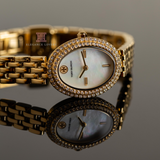 Buy Shop Tory Burch Oval Mother of Pearl Dial Gold Steel Strap Watch for Women - TBW6034 USA Online
