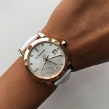 Burberry The City Silver Diamonds Dial White Leather Strap Watch for Women - BU9130