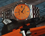 Maurice Lacroix Aikon Automatic Date Orange Dial Silver Steel Strap Watch For Men - AI6008-SS00F-530-E