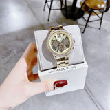 Buy Shop Michael Kors Bryn Pavé Quartz Gold Dial Gold Steel Strap Watch For Women - MK7199 USA Online