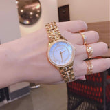 Buy Shop Michael Kors Lauryn Mother of Pearl White Dial Gold Steel Strap Watch for Women - MK3899 USA Online