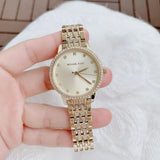 Buy Shop Michael Kors Melissa Quartz Gold Dial Gold Steel Strap Watch for Women - MK4368 USA Online