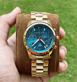 Buy Shop Michael Kors Runway Hunger Stop100 Series Blue Dial Gold Steel Strap Watch for Women - MK5815 USA Online