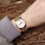 Buy Shop Movado Museum Classic Diamonds Mother of Pearl Dial Gold Steel Strap Watch For Women - 0606998 USA Online