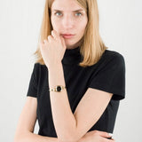 Buy Shop Movado Rondiro 22mm Black Dial Yellow Gold Steel Strap Watch For Women - 0606888 USA Online