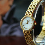 Buy Shop Tissot T-Lady Lovely Mother of Pearl Dial Gold Steel Strap Watch For Women - T058.009.63.116.00 USA Online