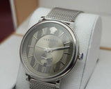 Buy Shop Versace V-Circle Silver Dial Silver Mesh Bracelet Watch for Men - VBQ060017 USA Online